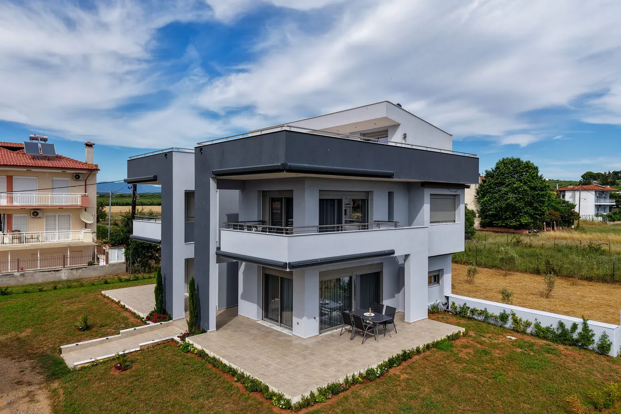 Contemporary facade and private ground-floor terraces