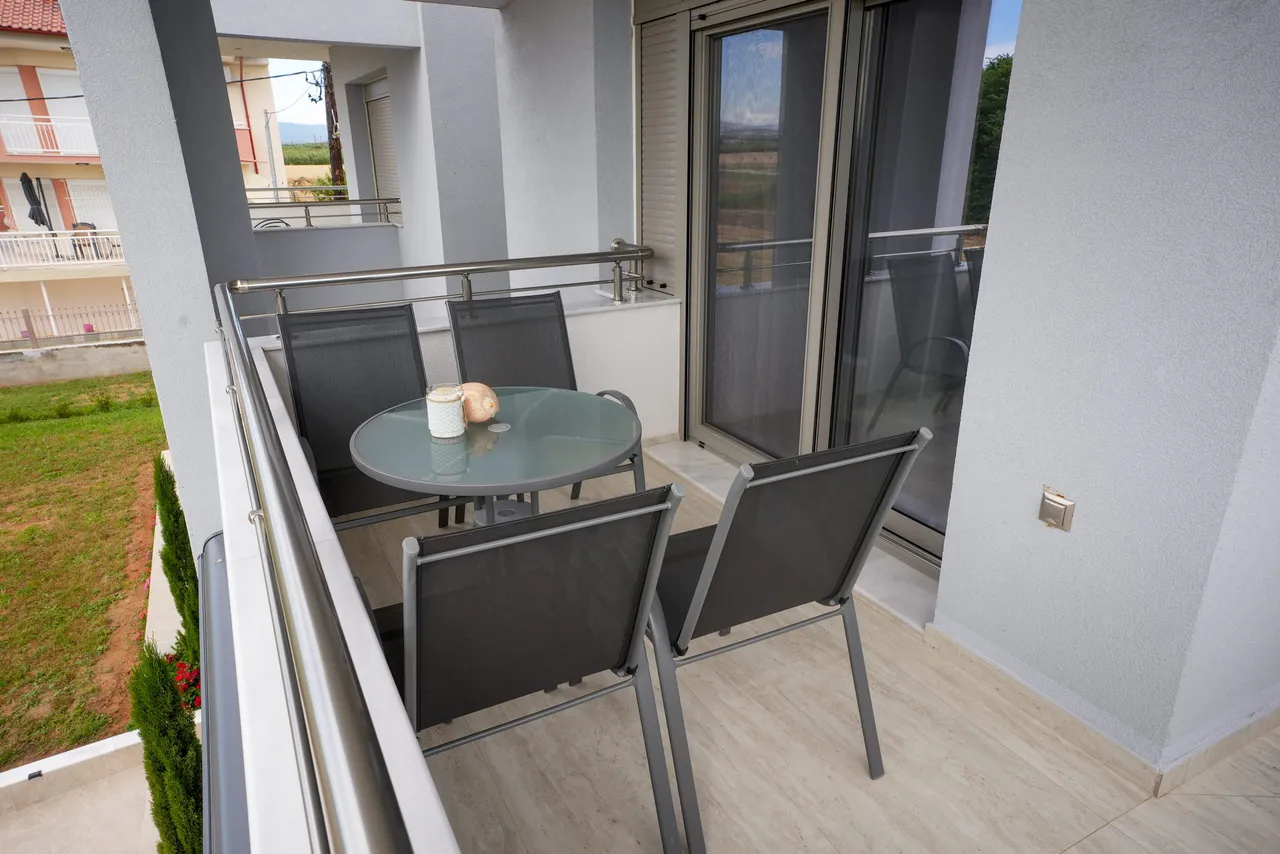 Intimate furnished balcony beside the bedroom