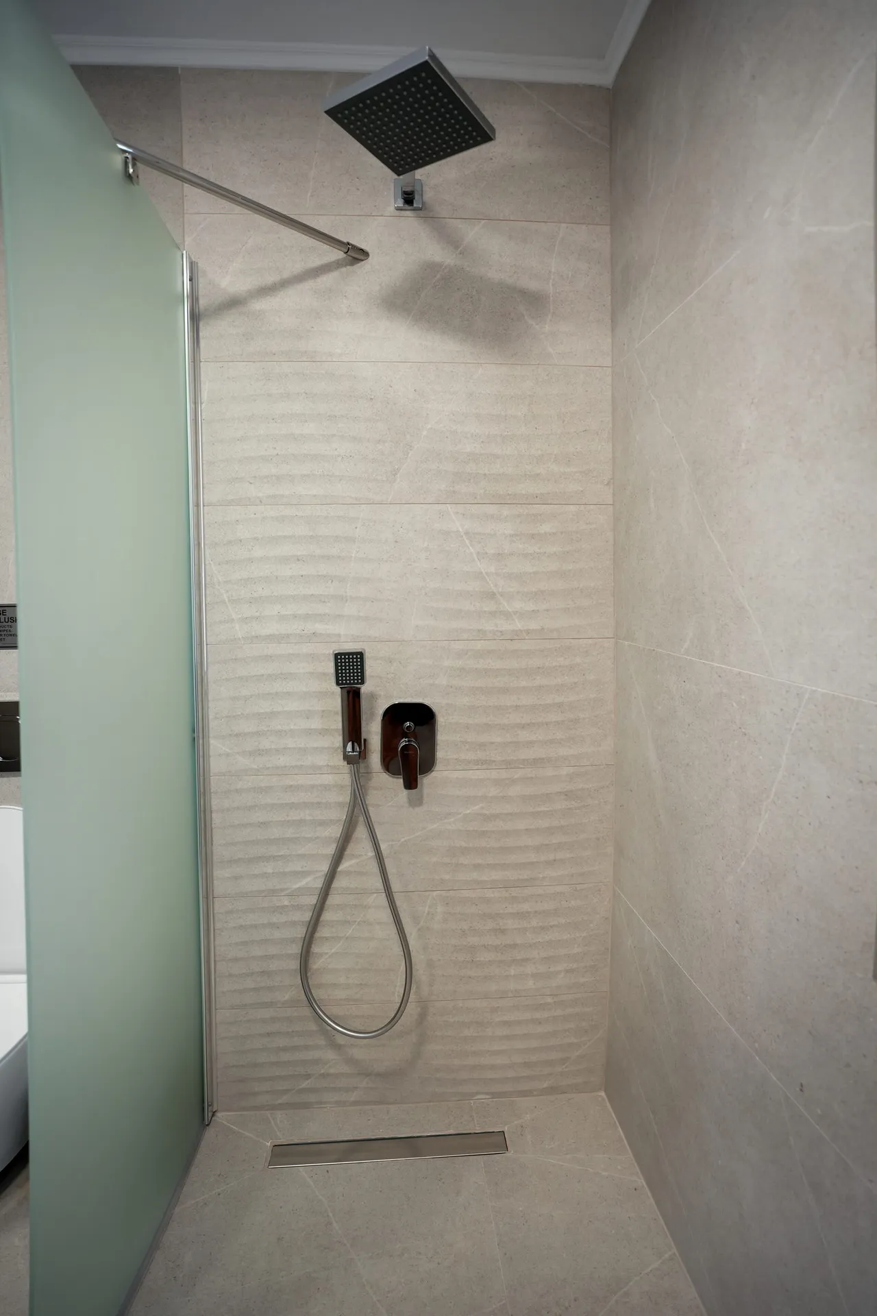 Walk-in rainfall shower in bathroom two